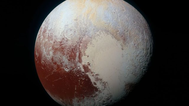 a colorful and dazzling view of pluto | موسوعة الشرق الأوسط